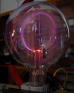 https://upload.wikimedia.org/wikipedia/commons/thumb/2/23/Cyclotron_motion_smaller_view.jpg/800px-Cyclotron_motion_smaller_view.jpg